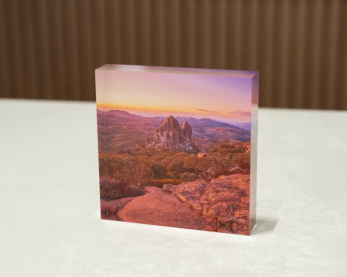 First Snow. Acrylic block of the Cathedral, Mount Buffalo Victoria, sitting on a desk.