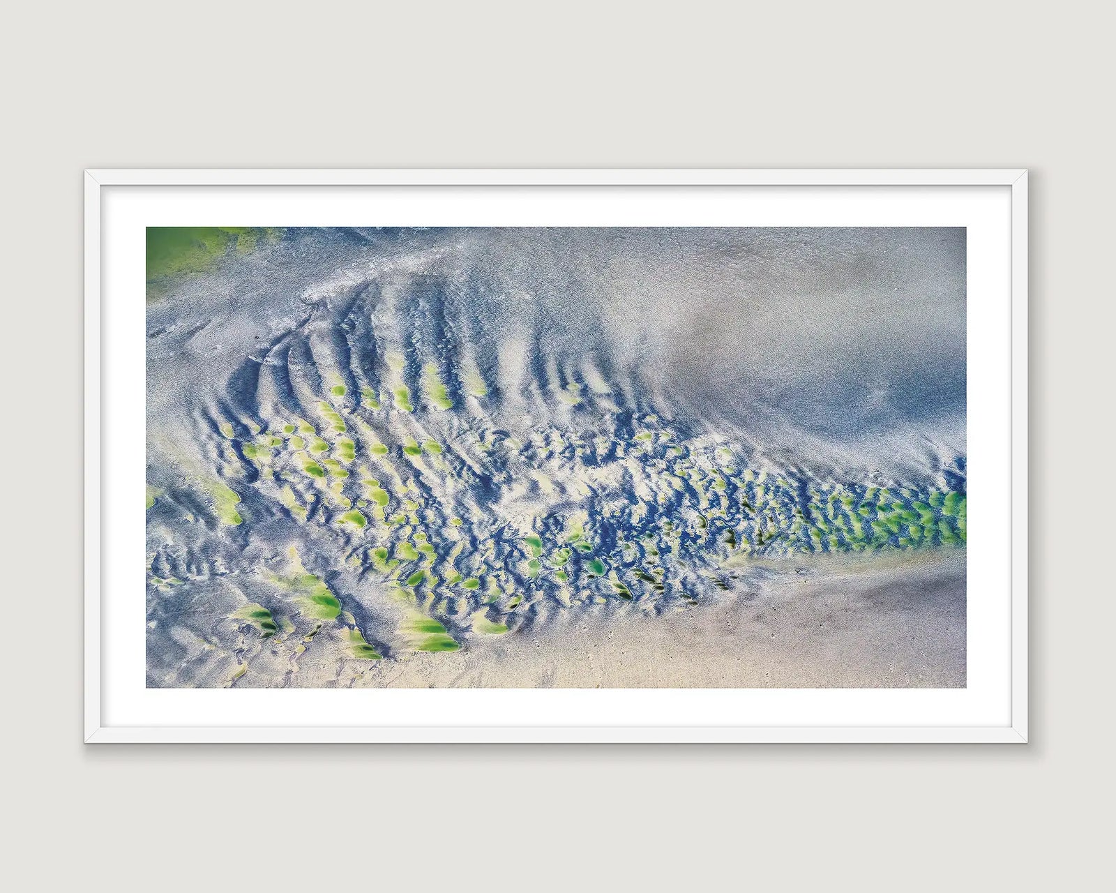 Framed aerial wall art of patterns in the sand created by tidal waters at Roebuck Bay. 