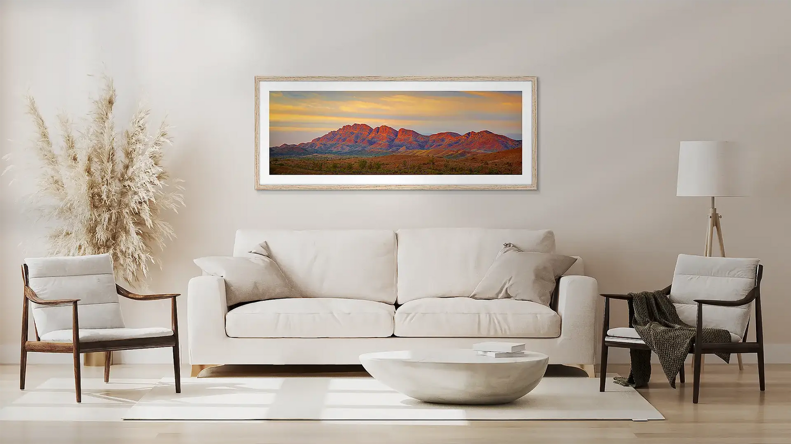 Flinders Ranges wall art print with tassie oak frame above couch.