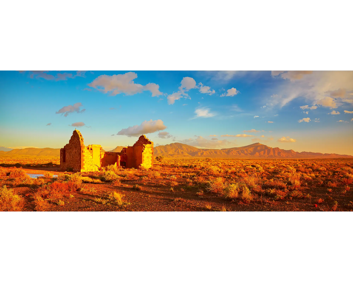 Flinders Ruins - Old farm house with Wilpena Pound in the background, Flinders Ranges.