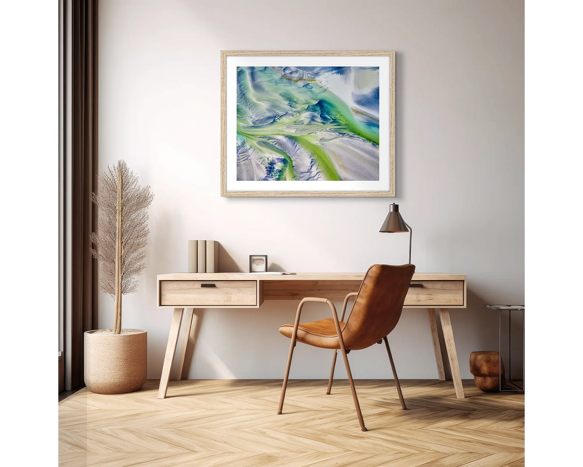 Flow. Abstract photographic wall art print with a Tassie Oak frame, hung above a scandi office desk. 