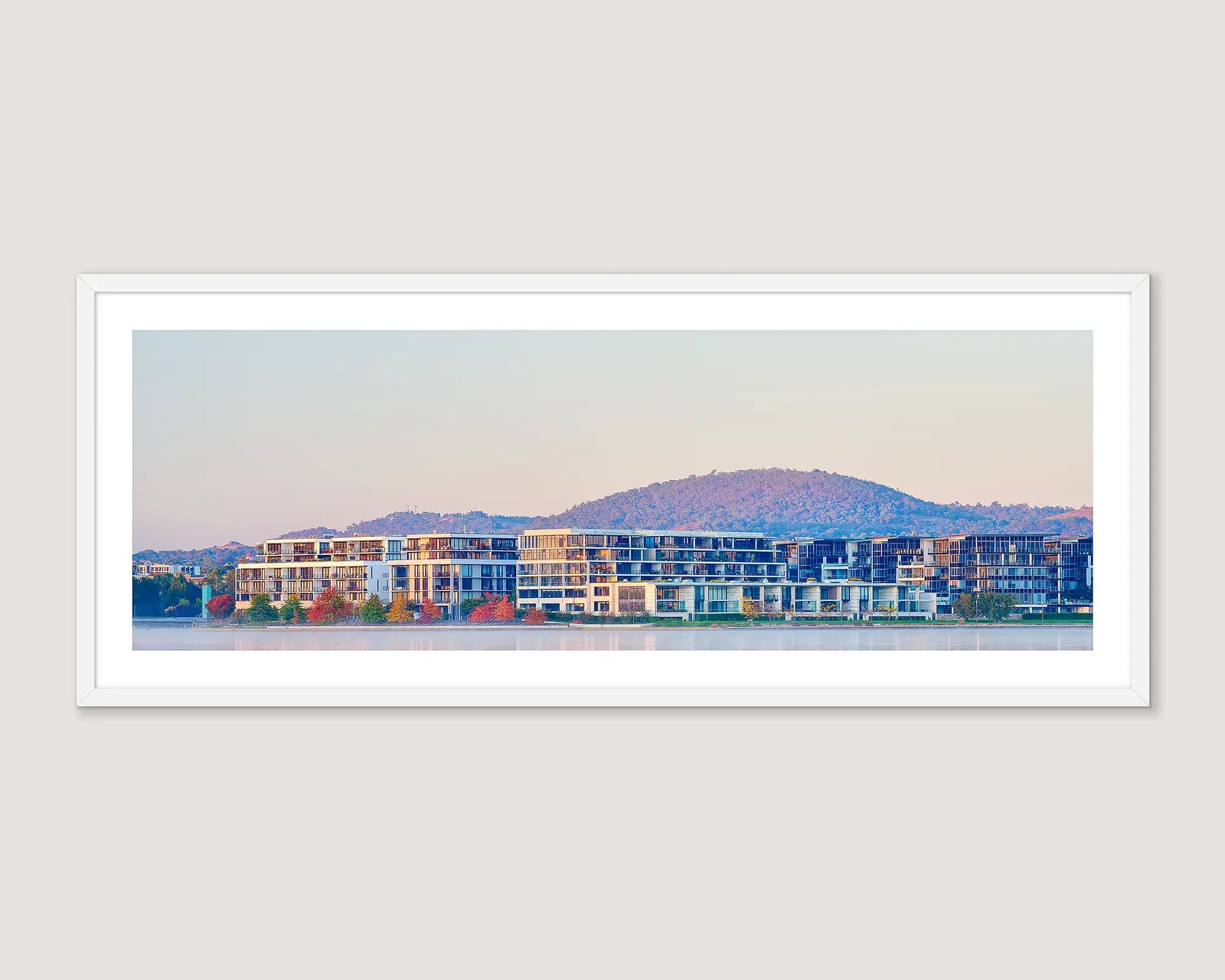 Framed photograph of the apartments on the Kingston foreshore of Lake Burley Griffin, at sunrise. 