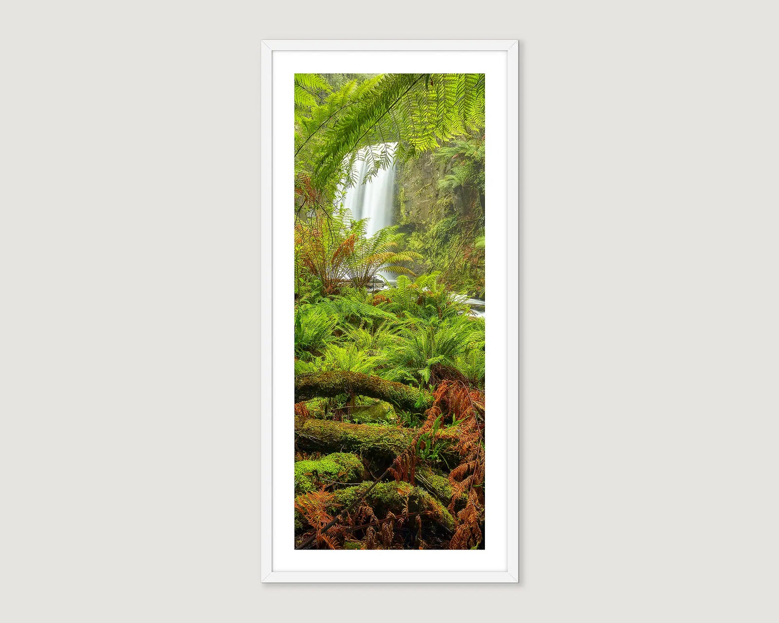 Framed wall art print of a waterfall in a lush green rainforest at Hopetoun Falls.