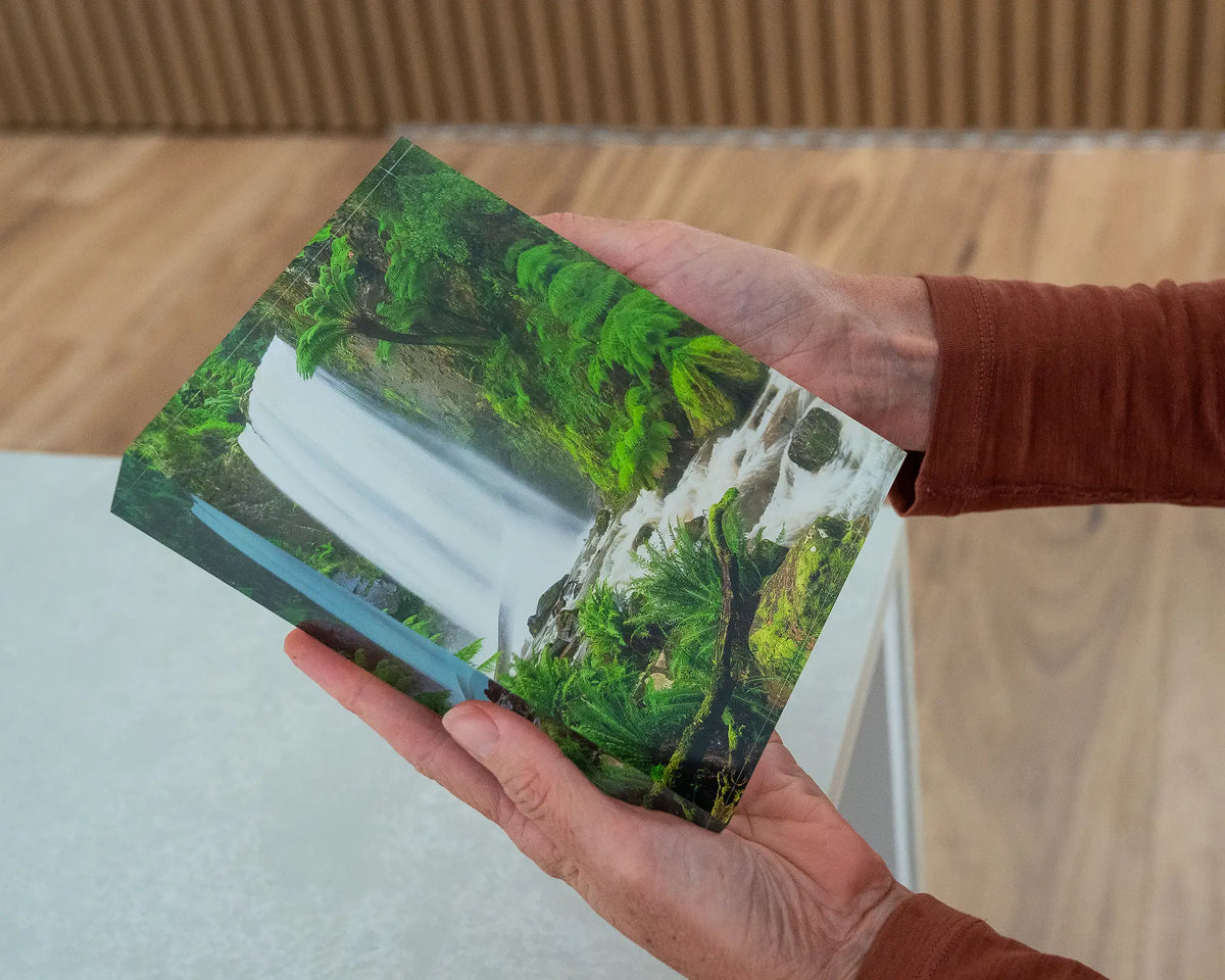Forest Veil. Acrylic block of Hopetoun Falls Victoria, held in hands.