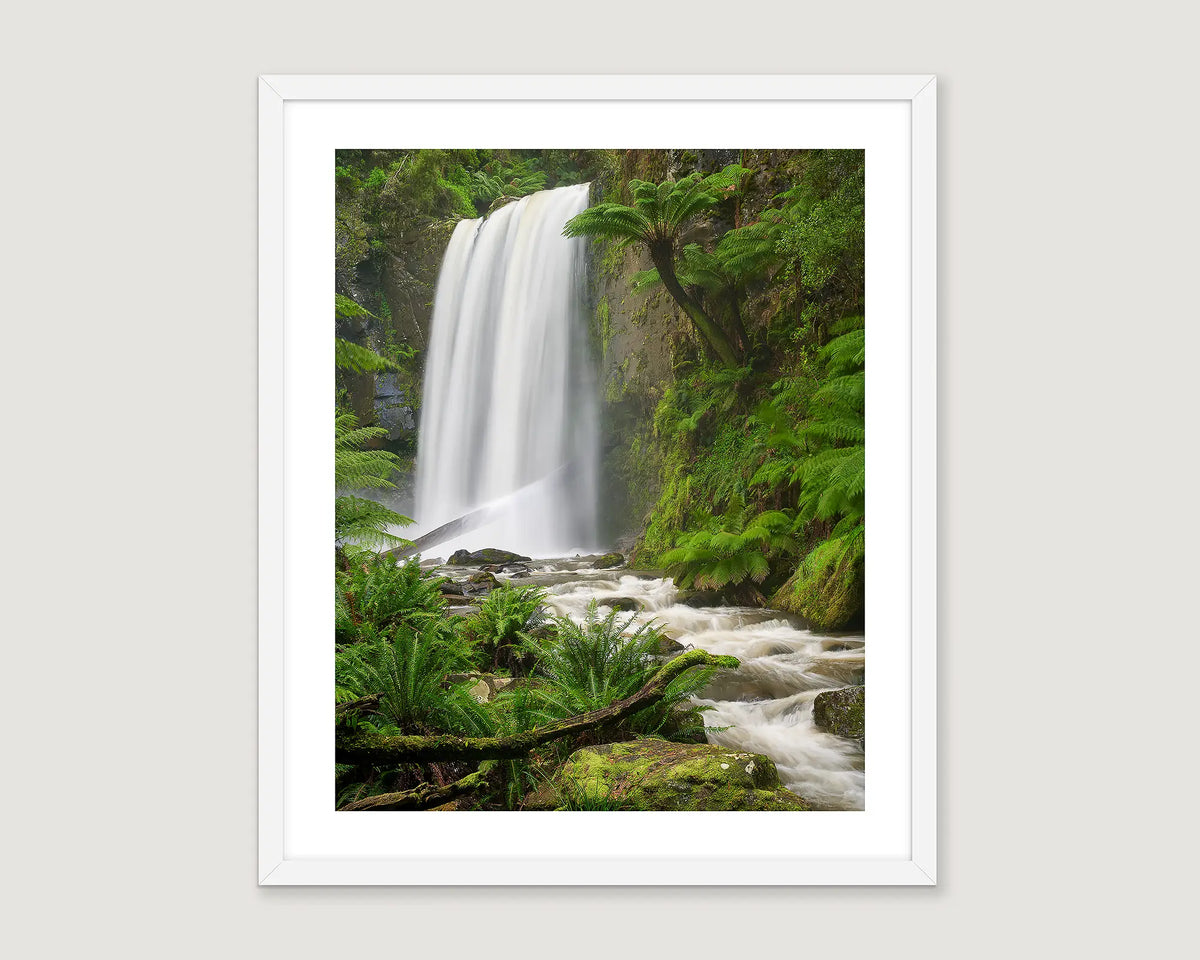 Framed photographic print of water flowing down the Hopetoun falls in the rainforest at Otway National Park. 