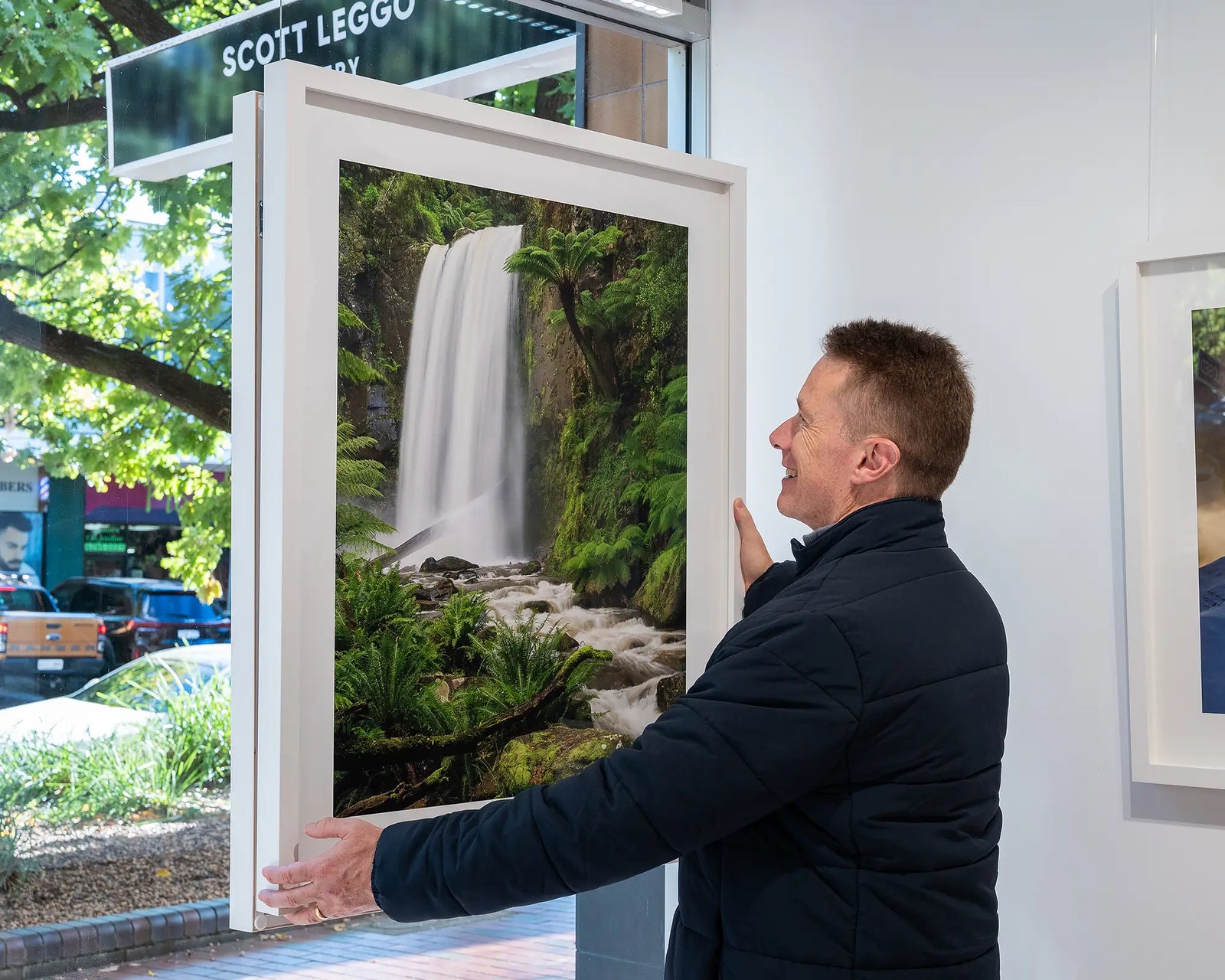 Framed photographic print of water flowing down the Hopetoun falls in the rainforest at Otway National Park. 