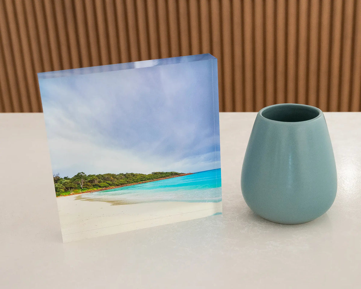 Geographe Calm. Acrylic block Meelup Beach, Geographe Bay Western Australia, on desk styled with a small vase.