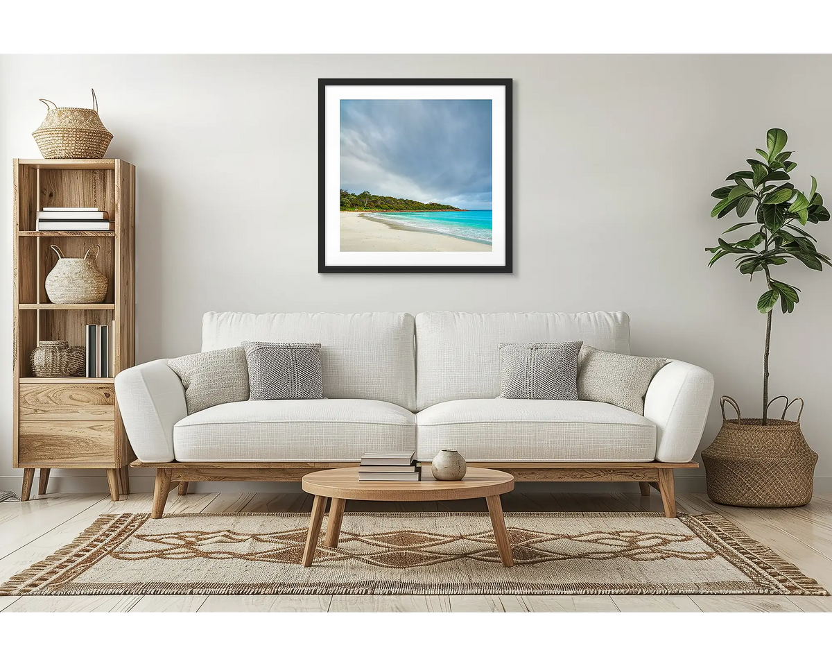 Geographe Calm. Coastal wall art with a black frame, in a lounge room. 