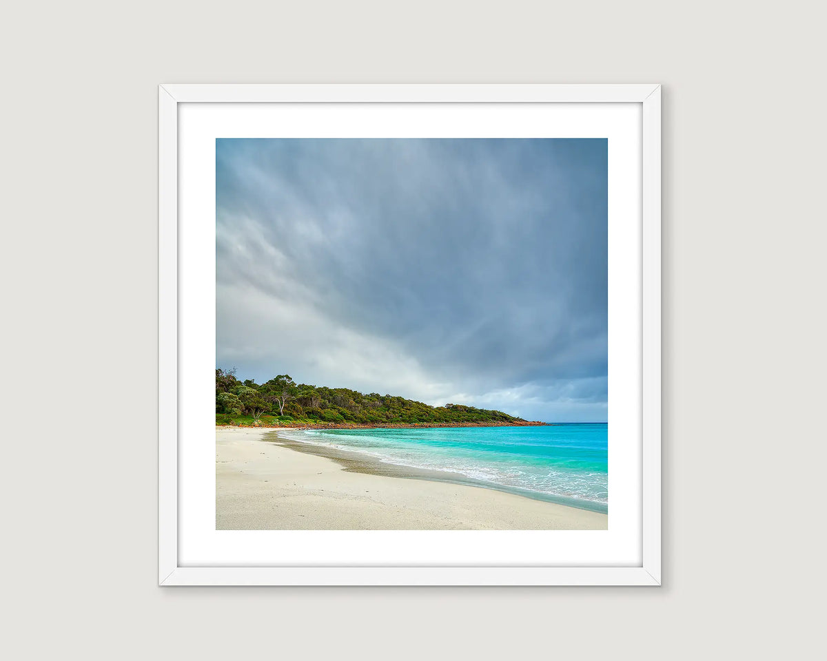 Framed coastal photograph of a tropical beach with turquoise water and white sand at Geographe bay. 