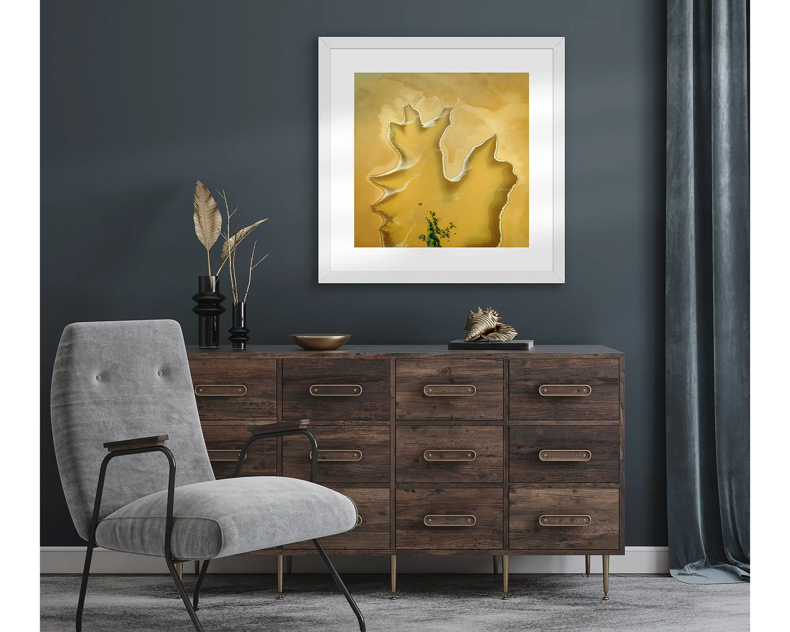 Framed wall art of mangrove trees and patterns created by tidal flats in golden sand at Derby. 