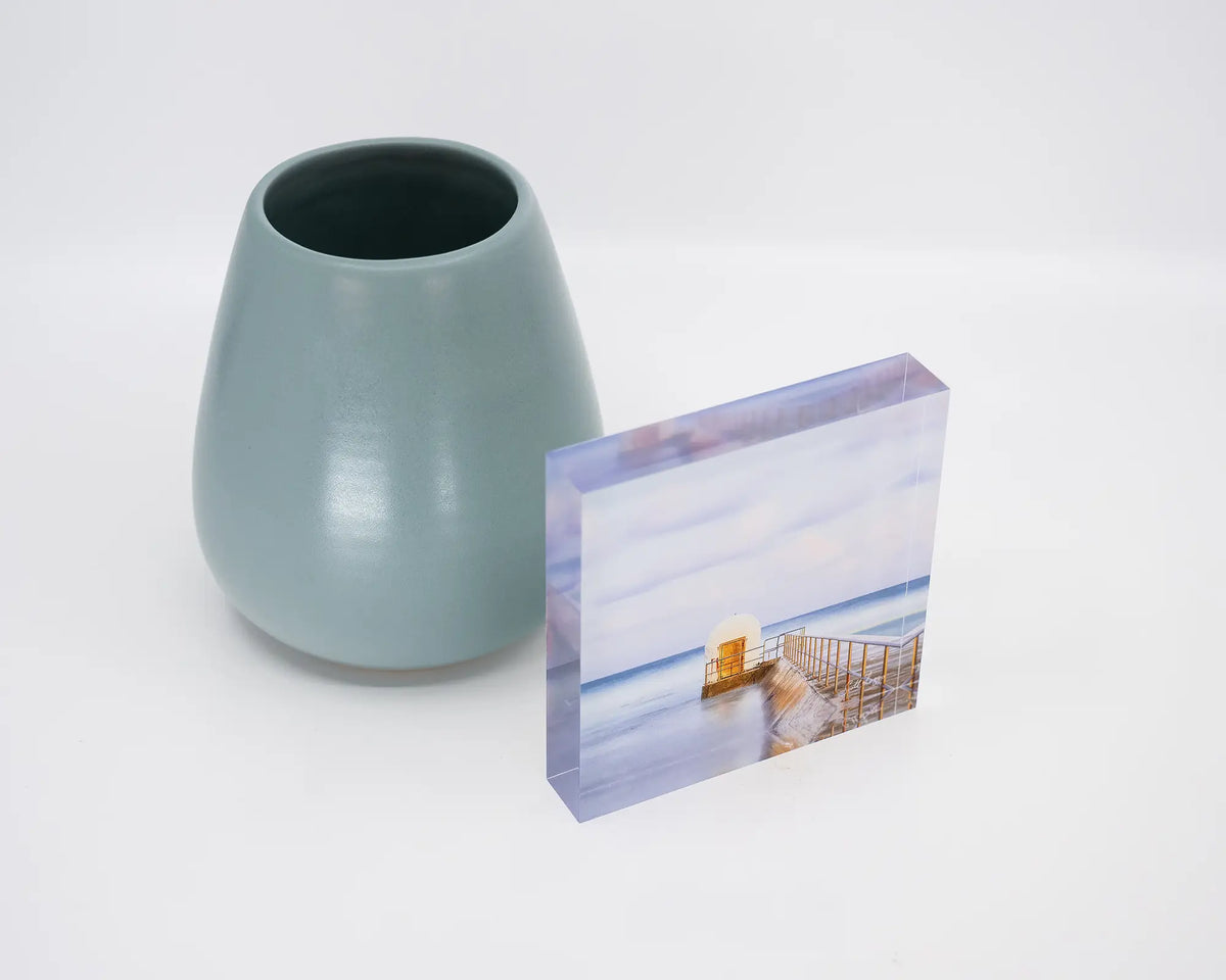 Golden Door. Acrylic block of dusk at Merewether Baths Newcastle, styled with a small vase.