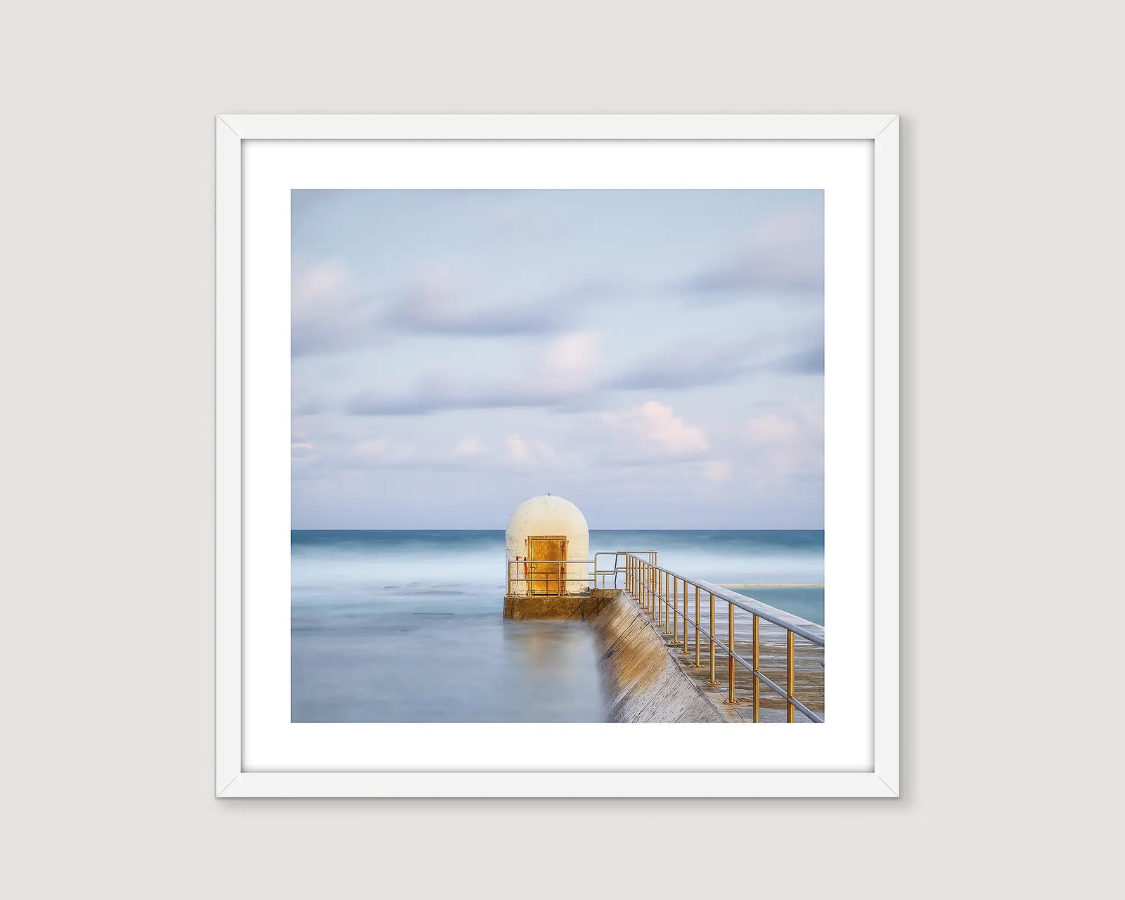 Framed coastal photographic print of an autumn sunset and the pumphouse at the  Merewether Baths, Newcastle. 