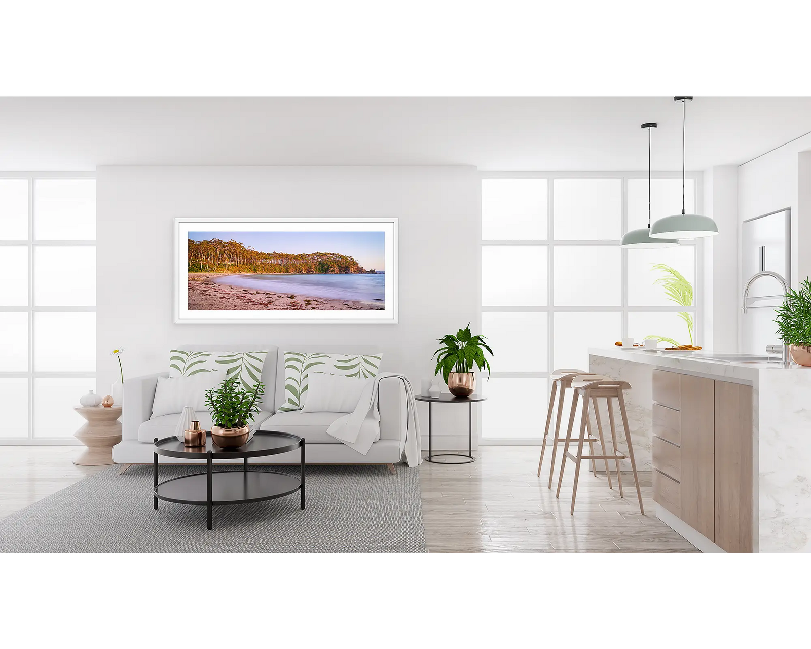 Framed artwork of a coastal scene with calm water and native bushland at Llilli Pilli. 