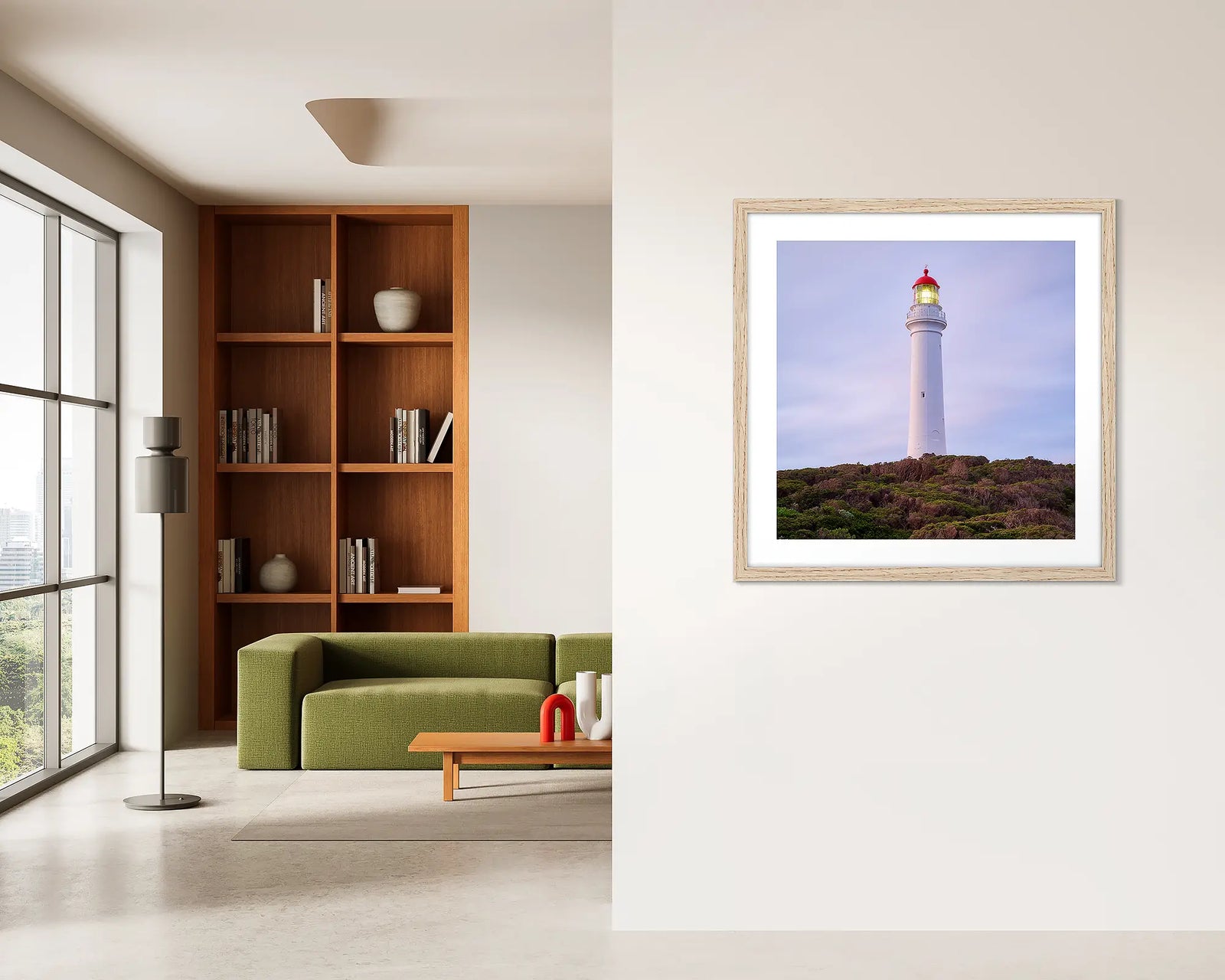 Framed wall art print of Split Point Lighthouse on a cliff surrounded by native coastal bush. 