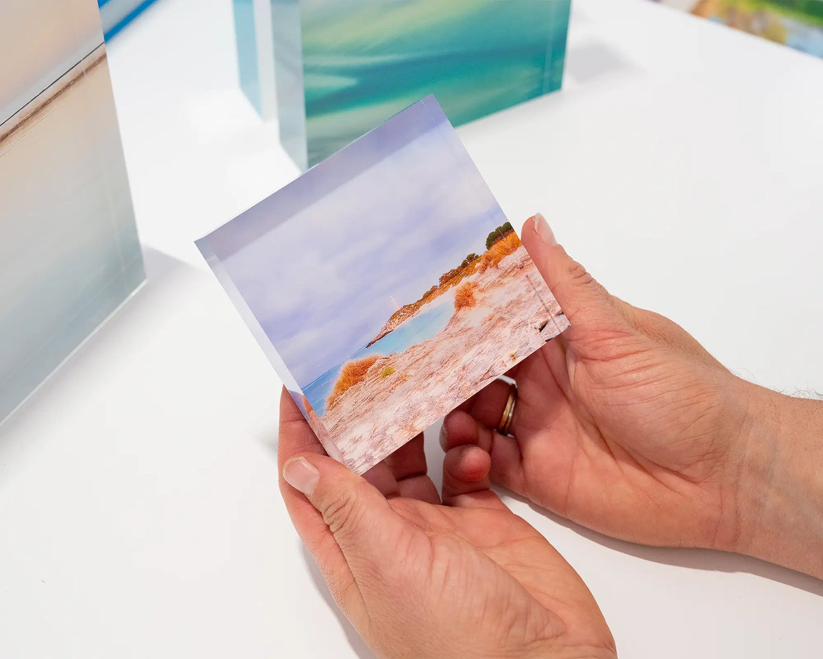 Haven. Acrylic block of Rottnest Island, Western Australia, held in hands.