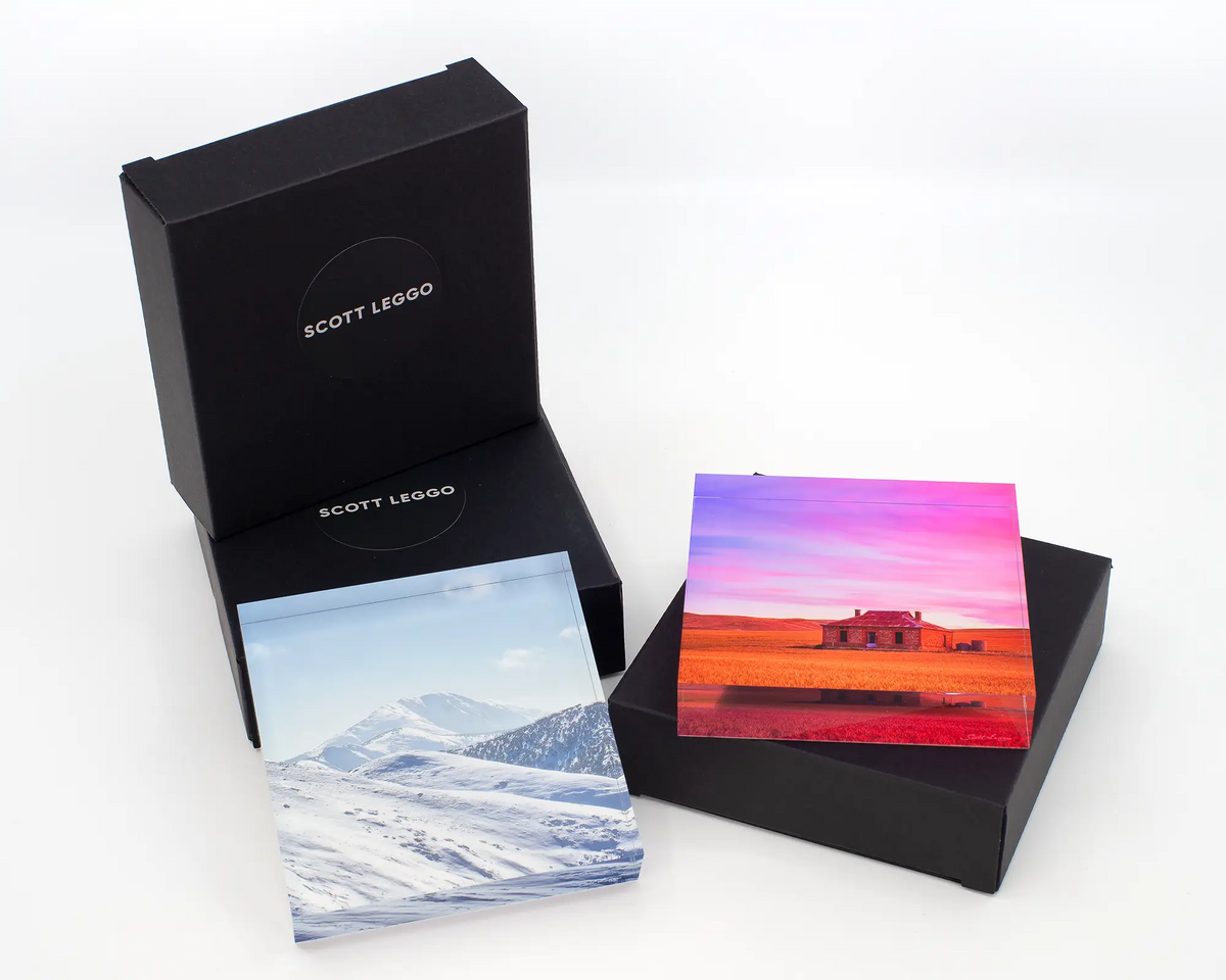 Icon of the Alps acrylic block with other square blocks and gift boxes. 