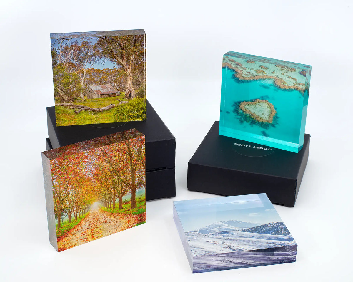 Icon of the Alps acrylic block with other square blocks and gift boxes. 
