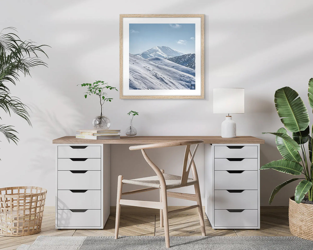 Icon Of The Alps. Mount Feathertop, photographic wall art print with a Tassie Oak frame, hung in a home office. 