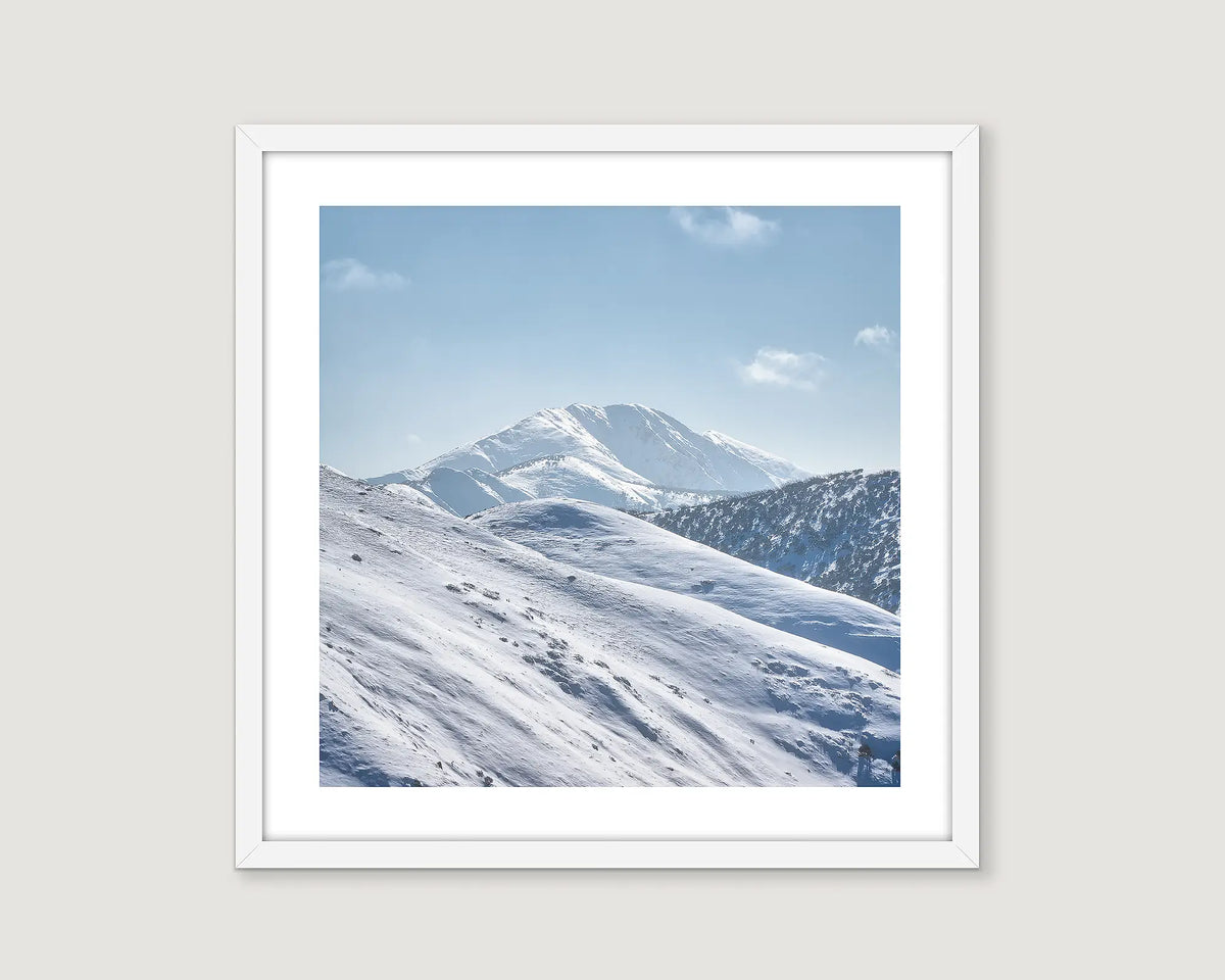 Framed photograph of Mount Feathertop ij snow. 