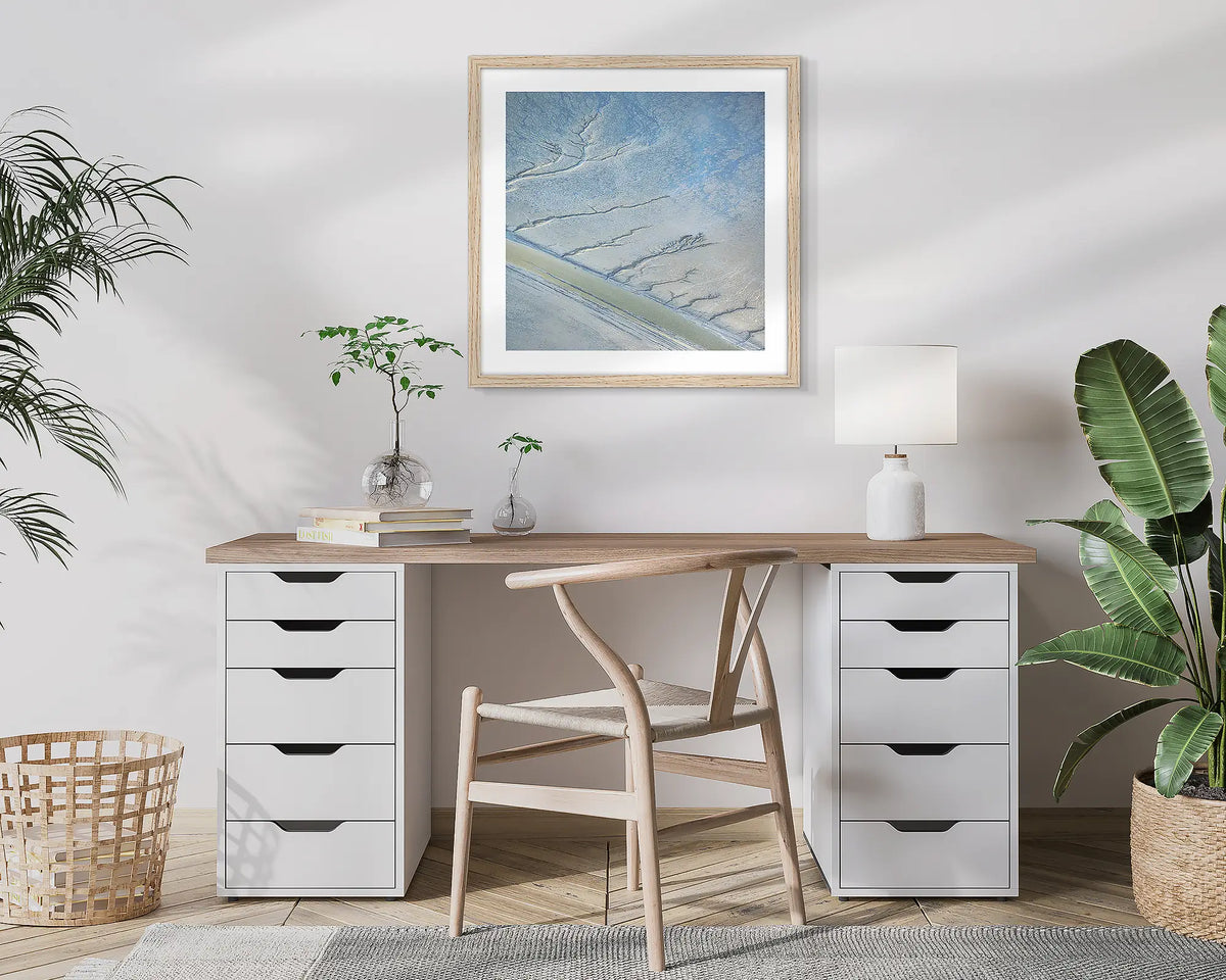 Increment. Aerial, abstract photographic wall art print with a Tassie Oak frame, hung in a home office. 