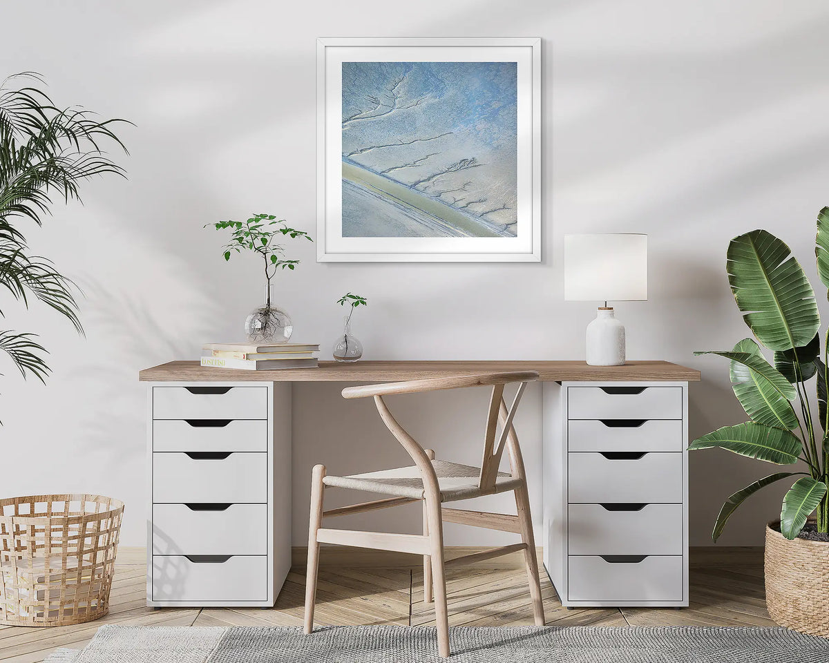 Increment. Aerial, abstract photographic wall art print with a white frame, hung in a home office. 
