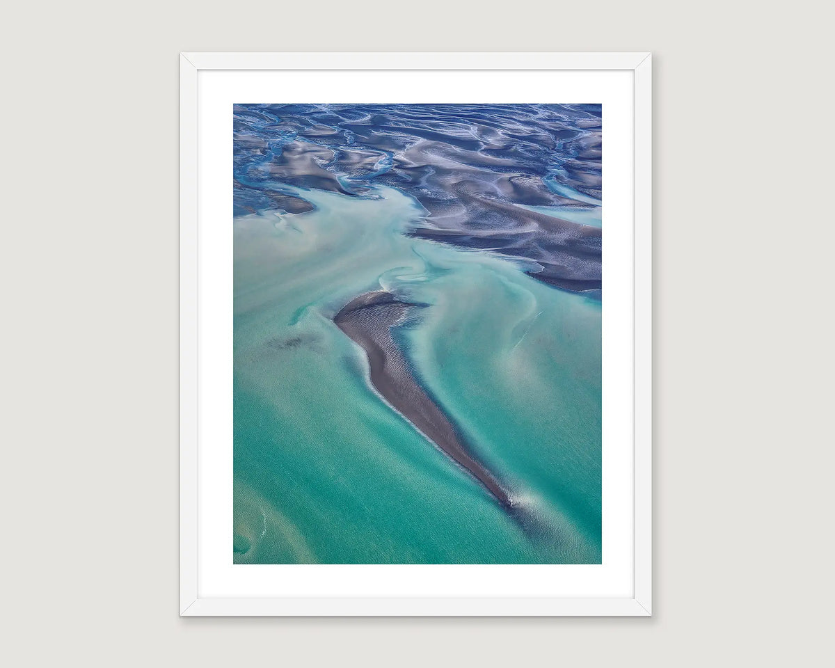 Framed wall art print of deep ocean colours created by the tide at Roebuck Bay. 