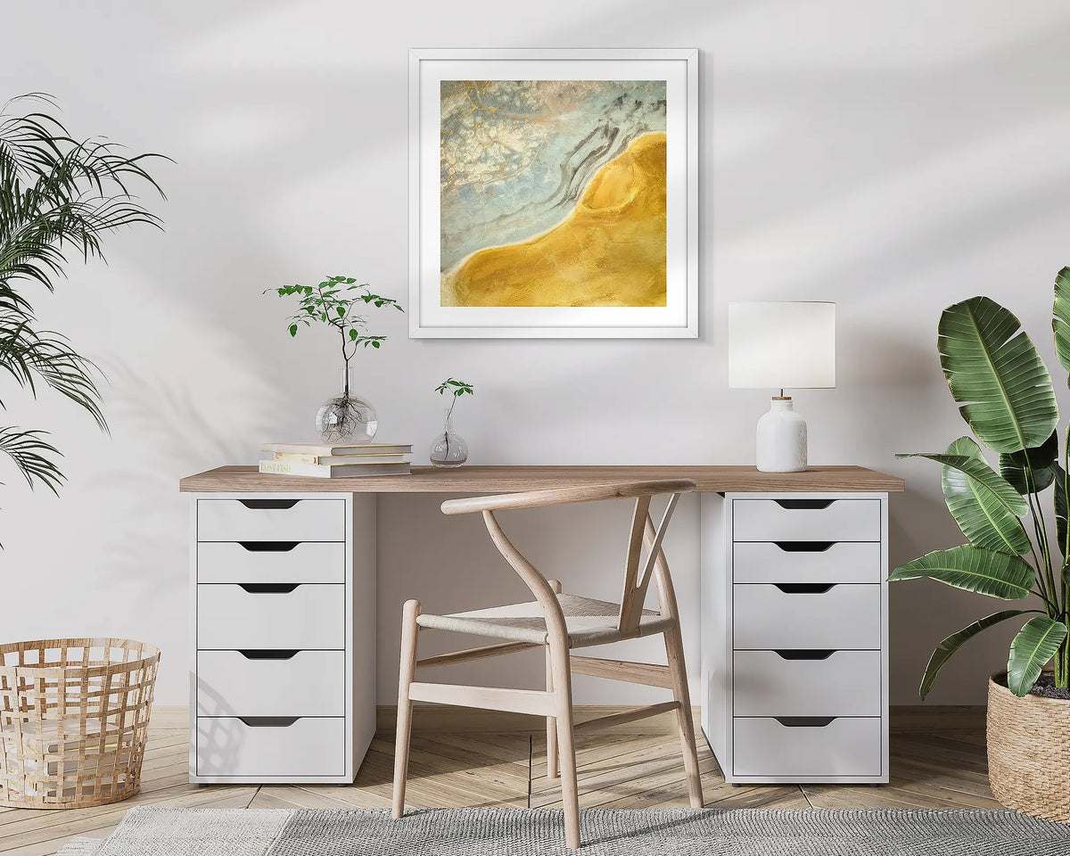 Interchange. Aerial, abstract photographic wall art print with a white frame, hung in a home office. 