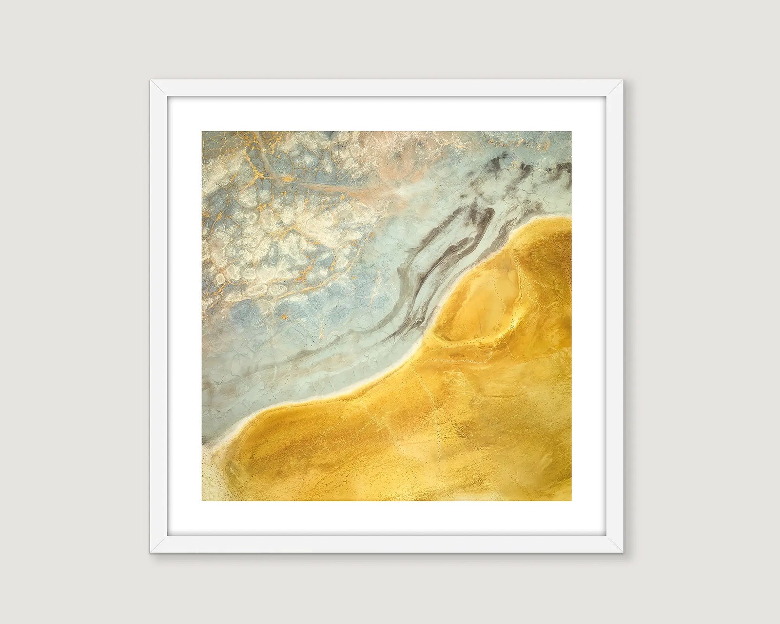 Framed abstract wall art print of patterns and colours created as a damn dries out.