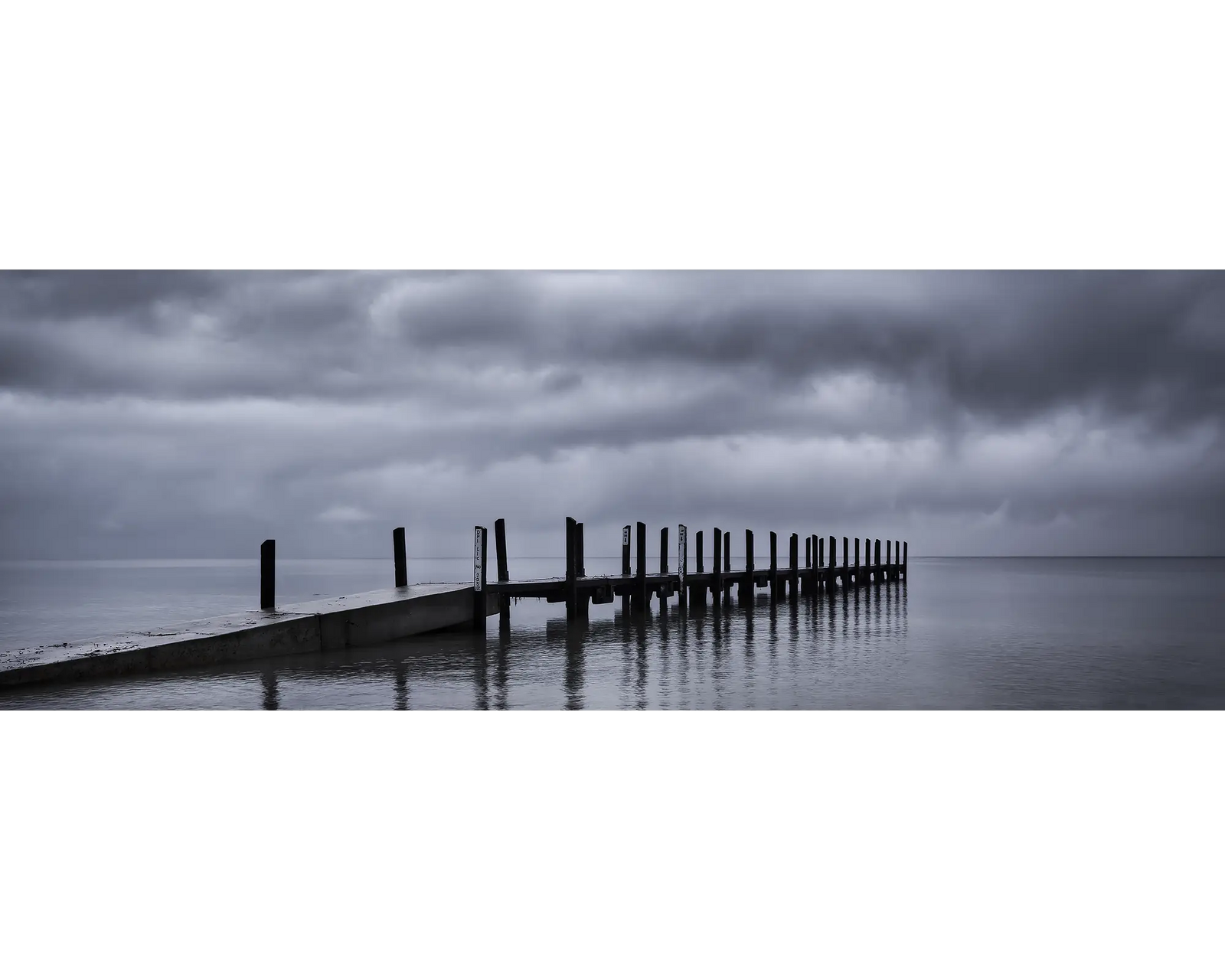 Storm clouds over Quindalup Jetty, Geographe Bay, WA. 