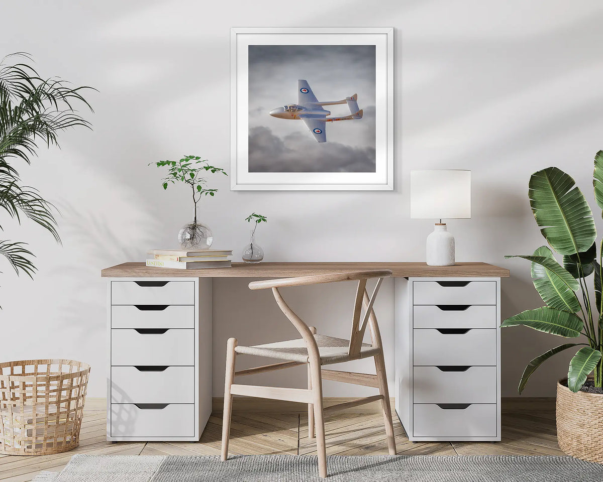 Interchange. Aerial, abstract photographic wall art print with a white frame, hung in a home office. 