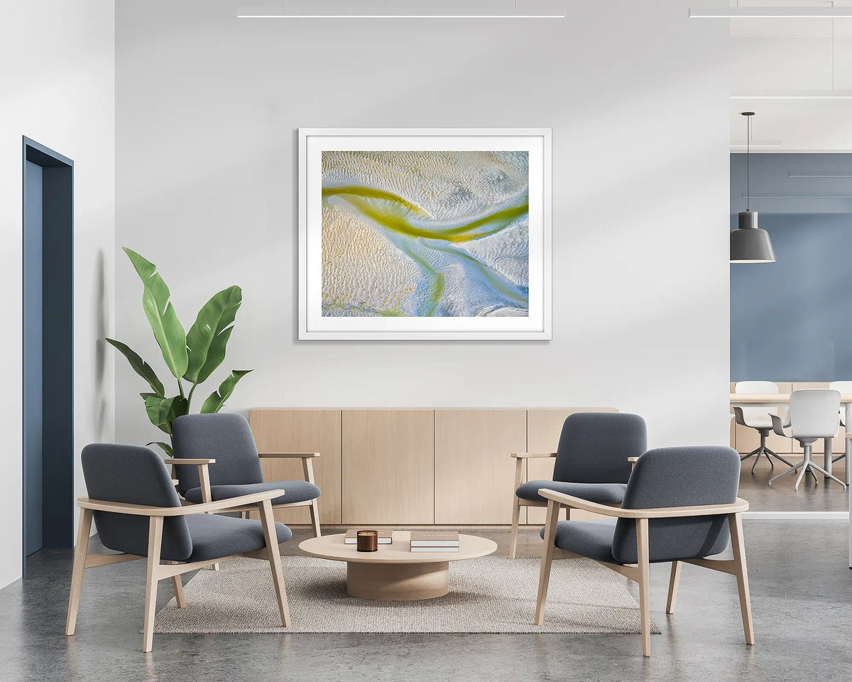 Jellyfish. Abstract wall art print with a white frame, hung on the wall of a waiting area.