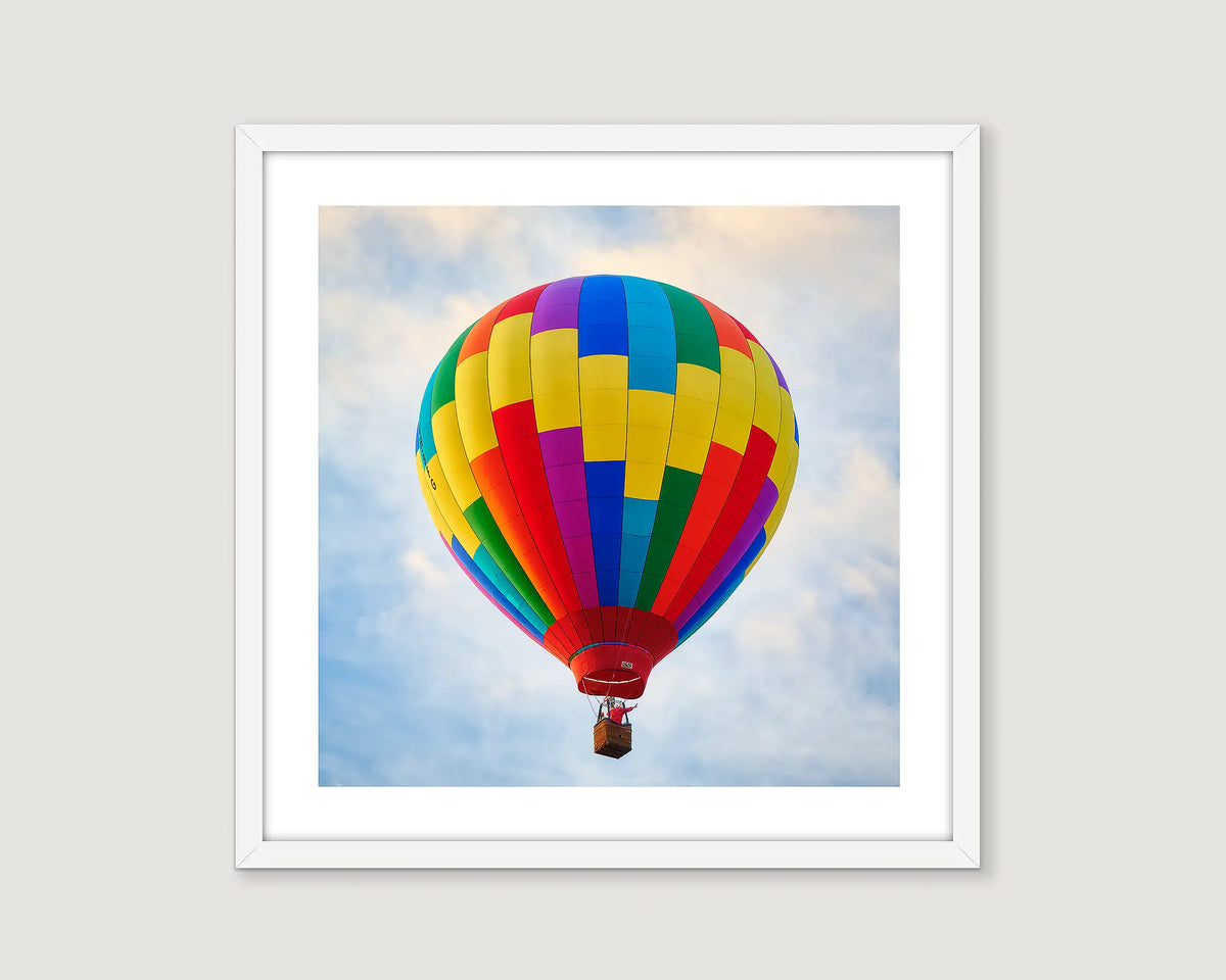 Framed wall art print of a colorful hot air balloon at the Balloon Spectacular Festival, Canberra. 