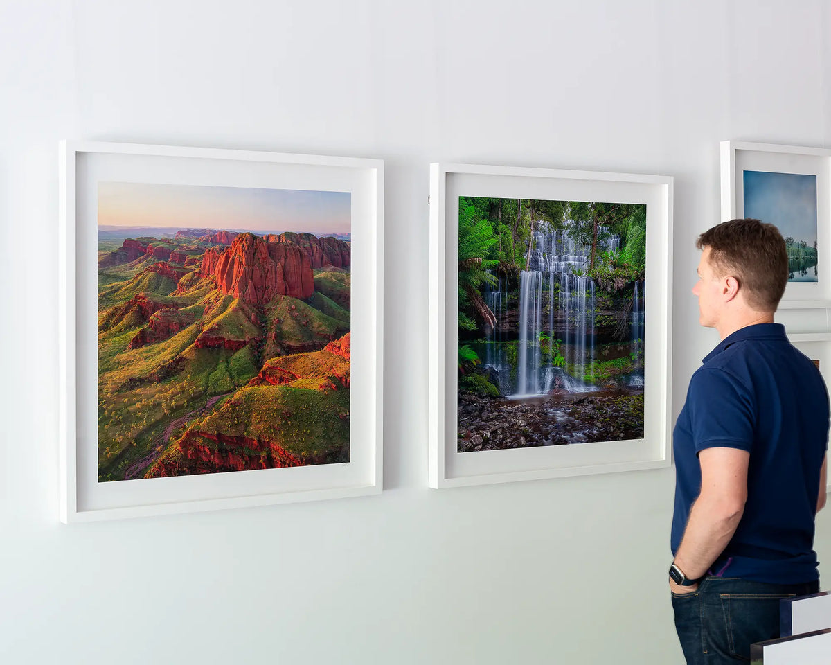 Kimberley Spirit. Outback artwork, white framed print, hanging on Scott Leggo Gallery wall.