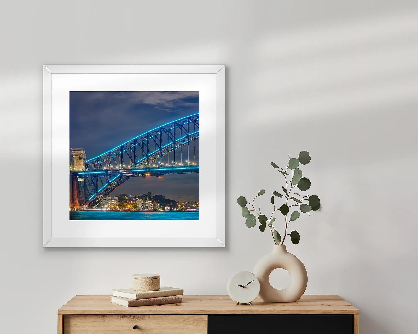 Framed wall art print of Sydney Harbour Bridge lit up at night during the Vivid Festival. 