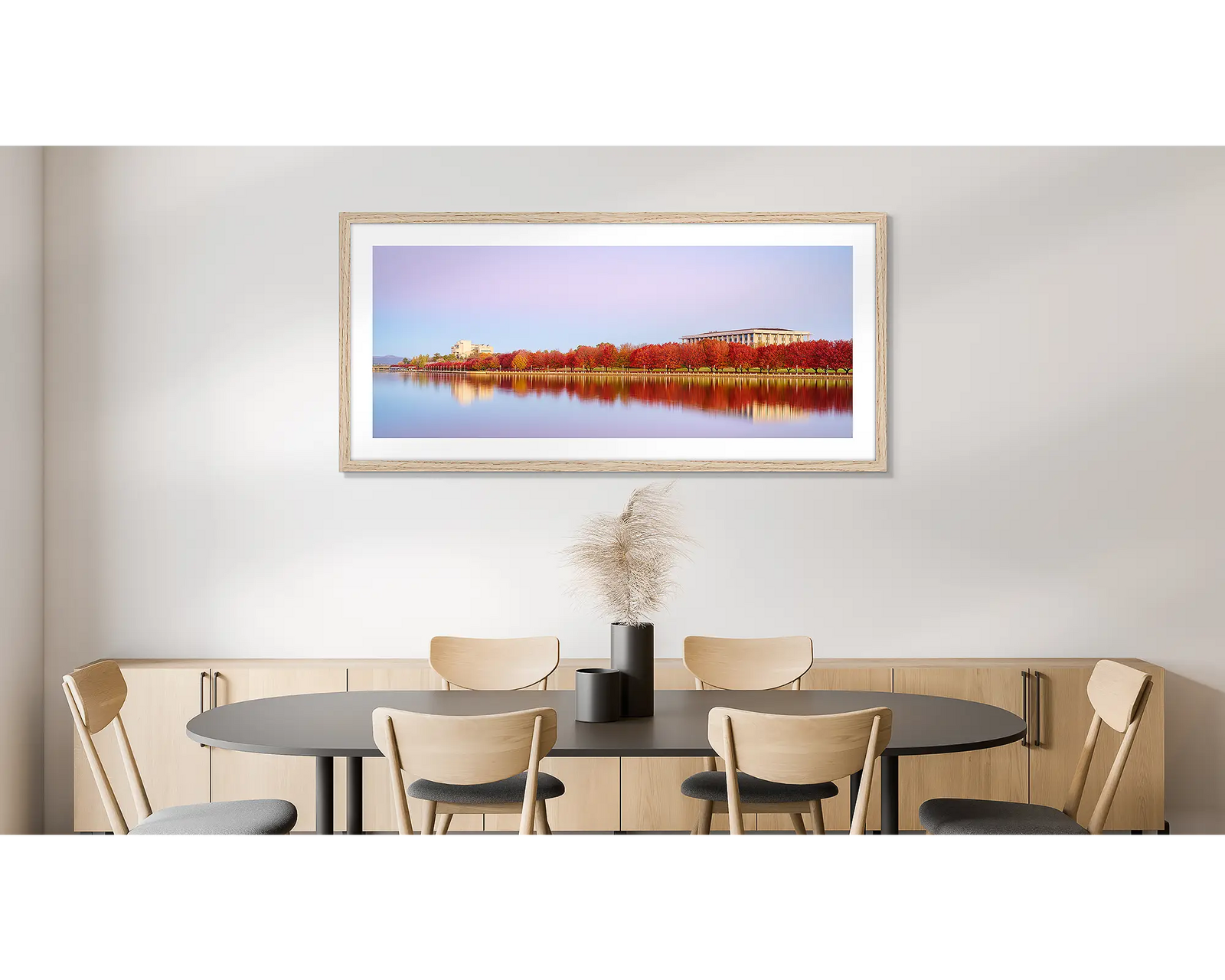 Lakeside Hues. Red autumn trees beside Lake Burley Griffin, National Library and High Court, Canberra.