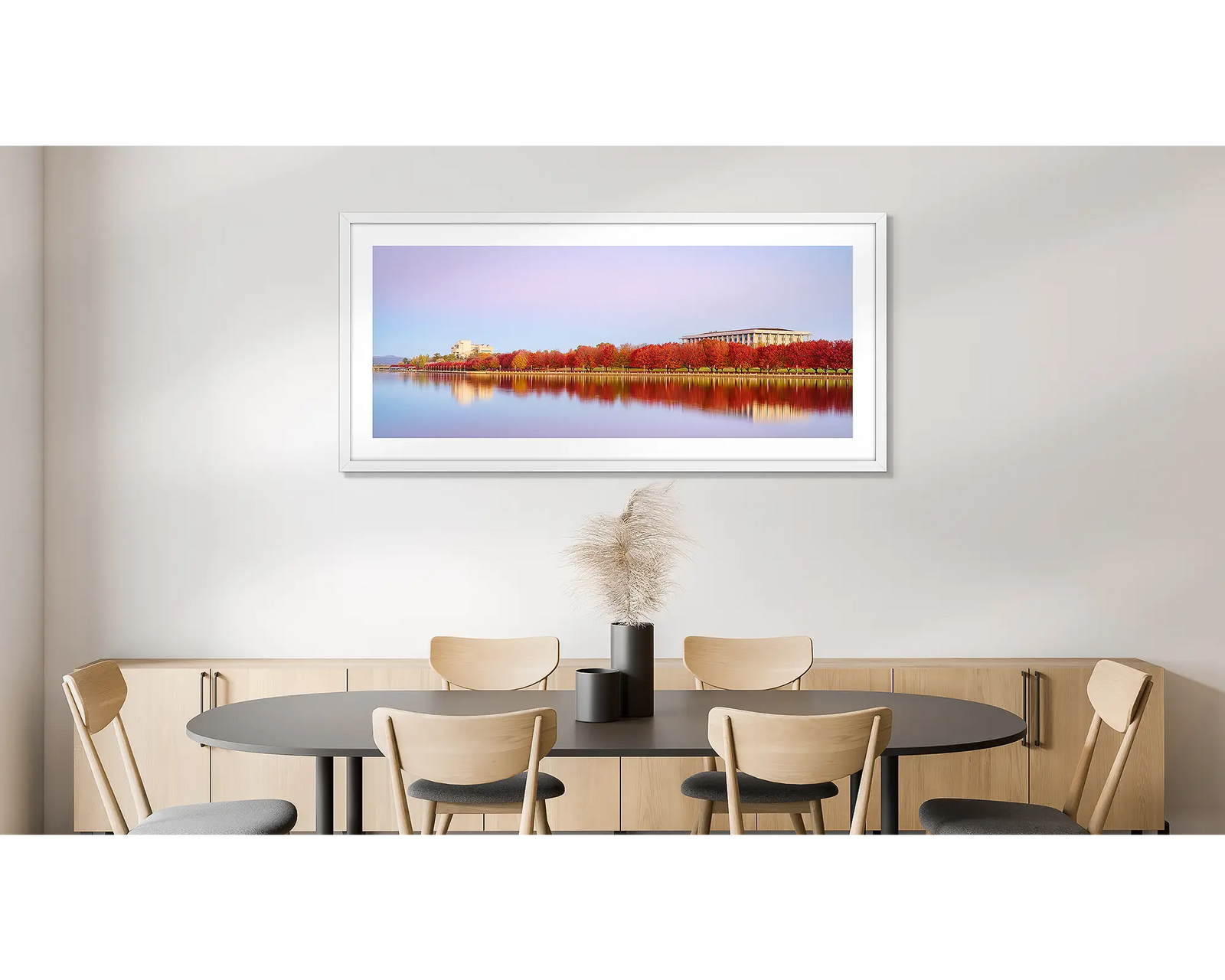 Lakeside Hues. Red autumn trees beside Lake Burley Griffin, National Library and High Court, Canberra.