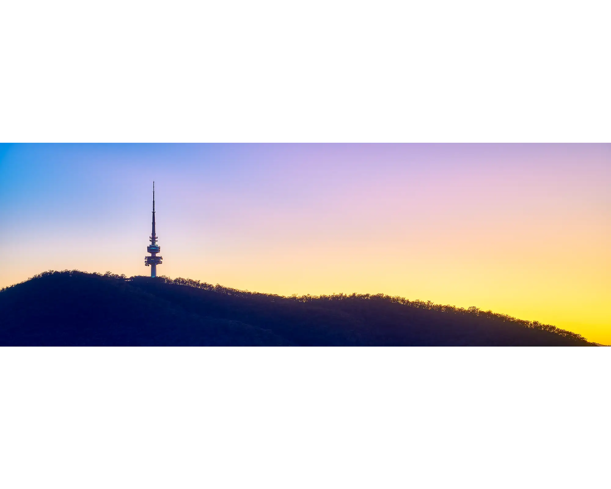 Landmark. Telstra Tower at sunrise, Black Mountain, Canberra.
