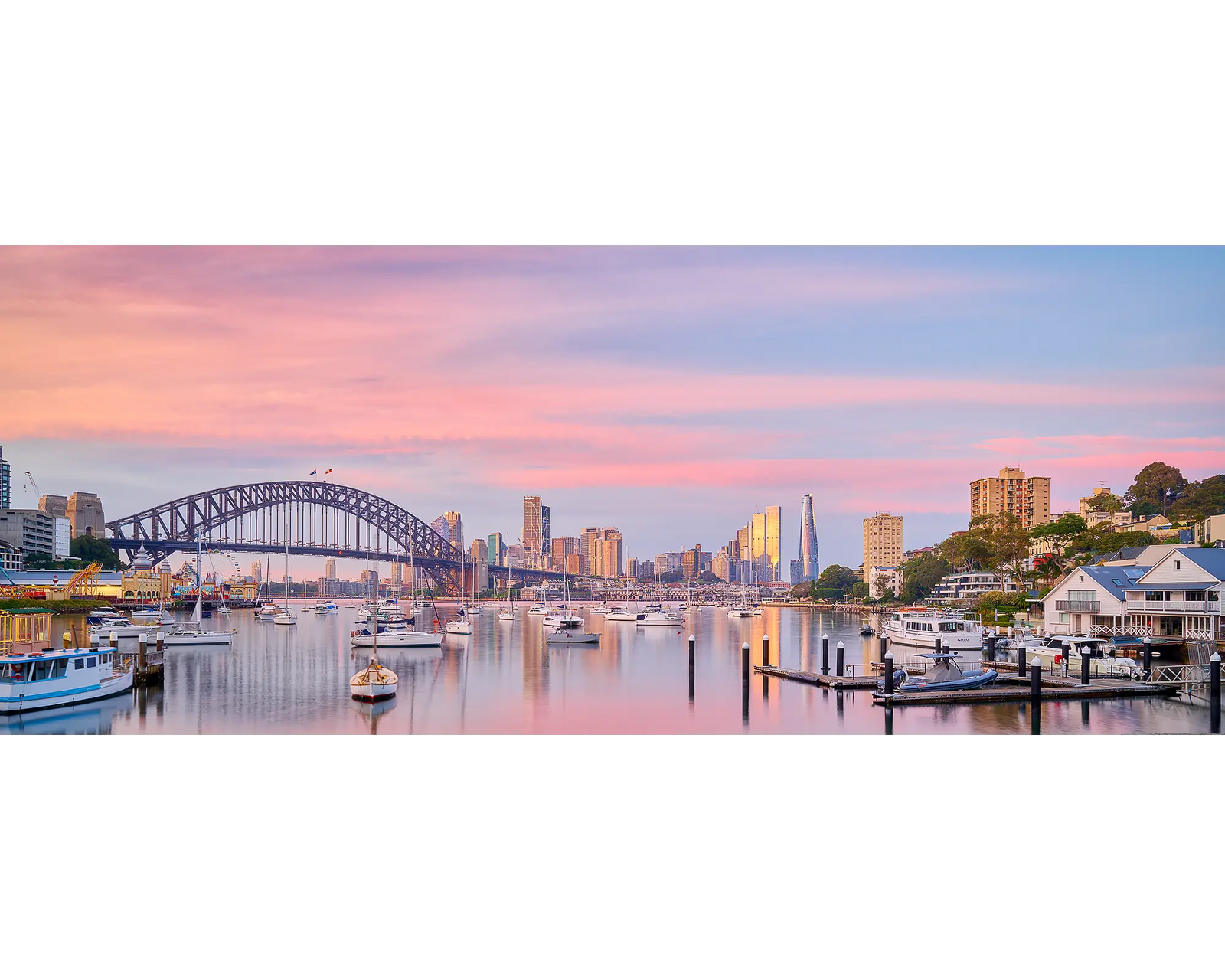 Pink sunrise over Sydney Harbour Bridge and Lavender Bay, Sydney.