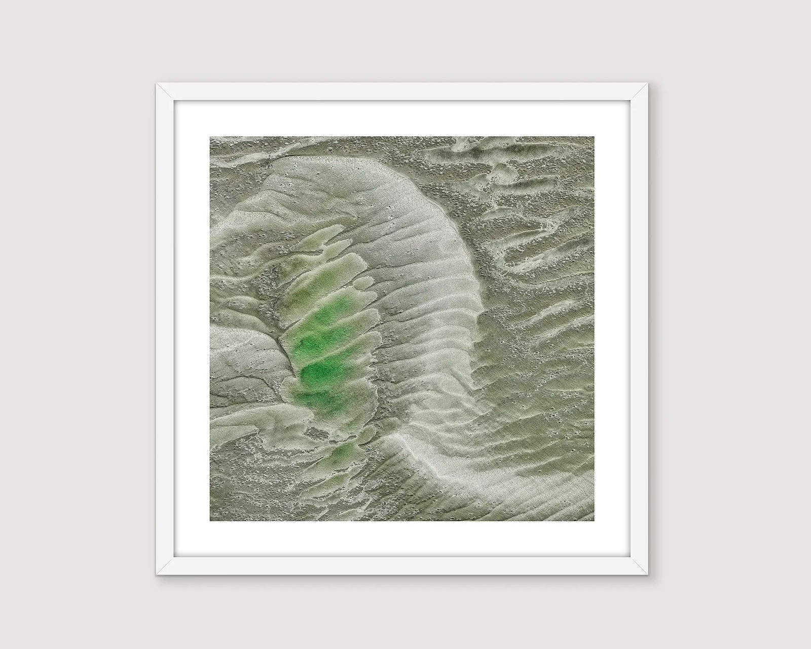 Framed wall art print of patterns created in the sand by tidal waters in the Whitsundays. 