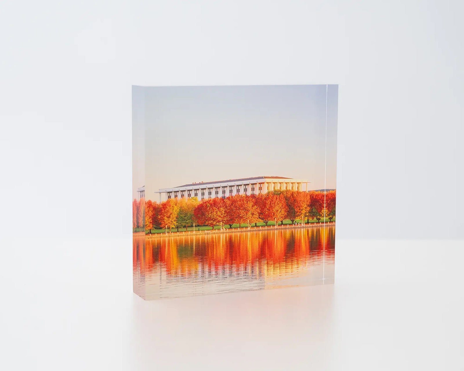 Library Reds. Acrylic block of National Library of Australia in Autumn.