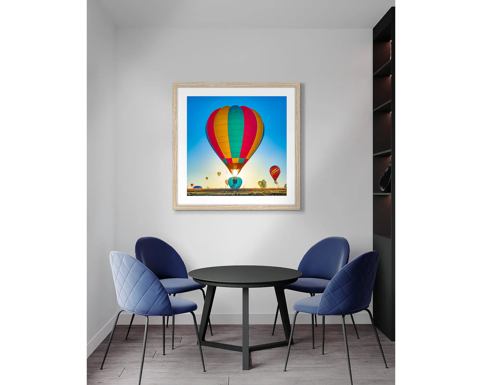 Lift. Canberra hot air balloon, framed wall art print, with a timber frame, in an office meeting room. 