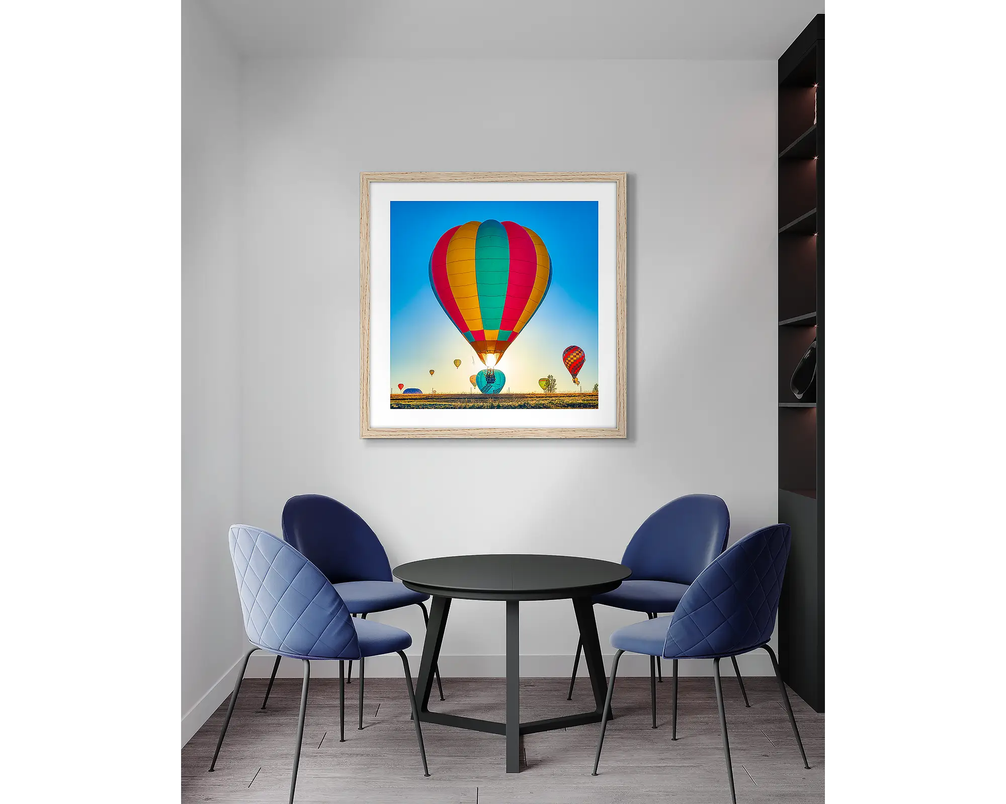Lift. Canberra hot air balloon, framed wall art print, with a timber frame, in an office meeting room. 