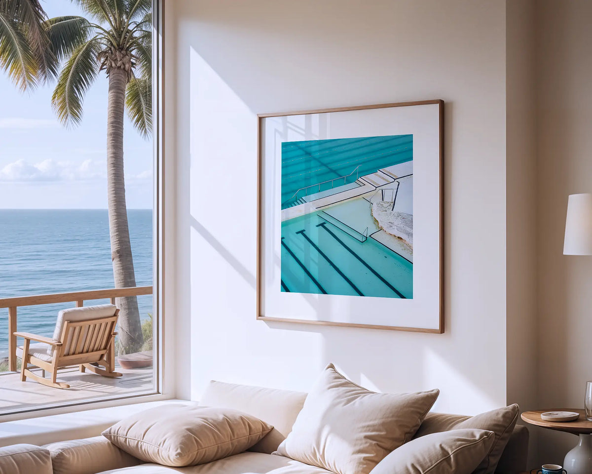 Lines. Photographic wall art print of Bondi Icebergs, with a timber frame hung in a coastal house. 