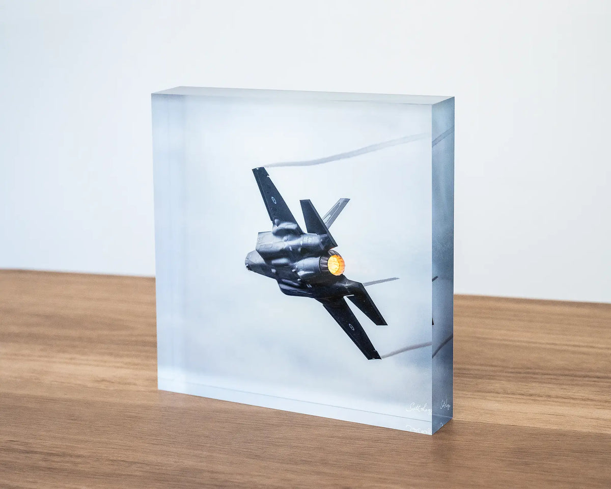 Lit. Aviation acrylic block of F35 JSF in afterburner, Australian Air Force, sitting on a desk.