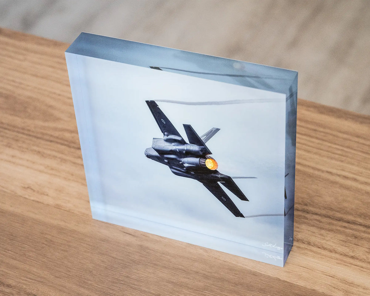 Lit. Aviation acrylic block of F35 JSF in afterburner, Australian Air Force, top view sitting on desk.