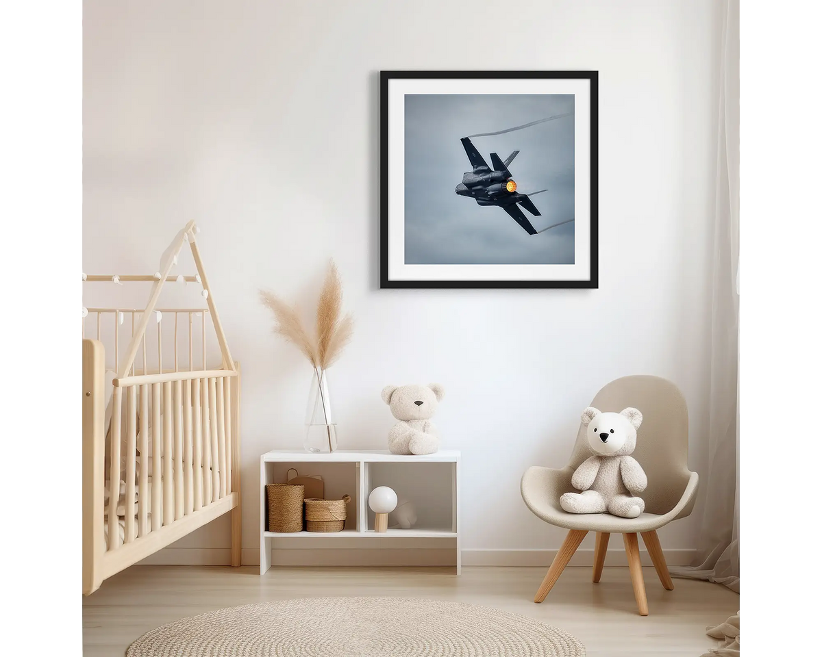 Lit. Aviation photographic wall art print, with a black frame, hung in a scandi kids bedroom. 