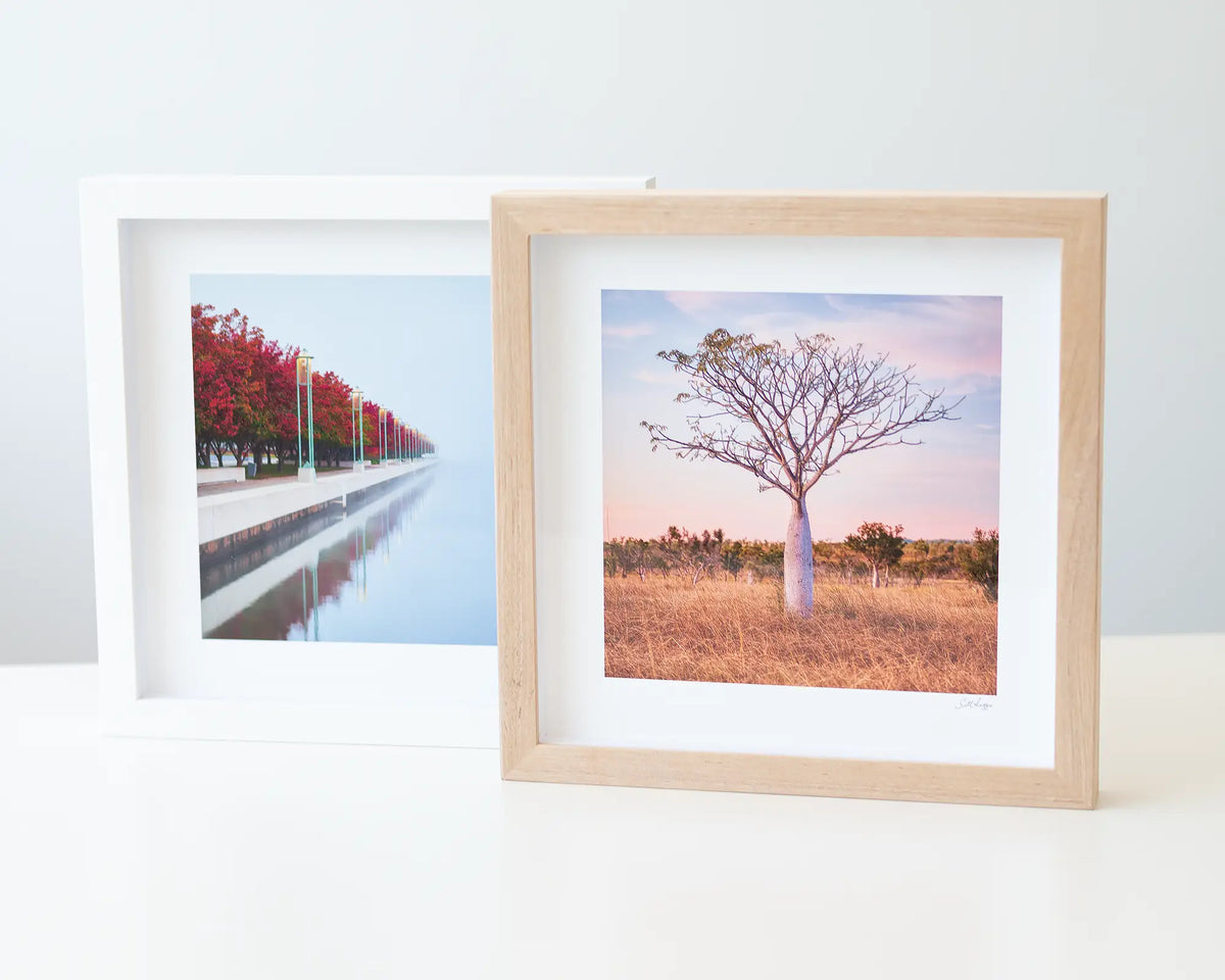 Little One and Red Serenity small framed prints sitting next to each other.