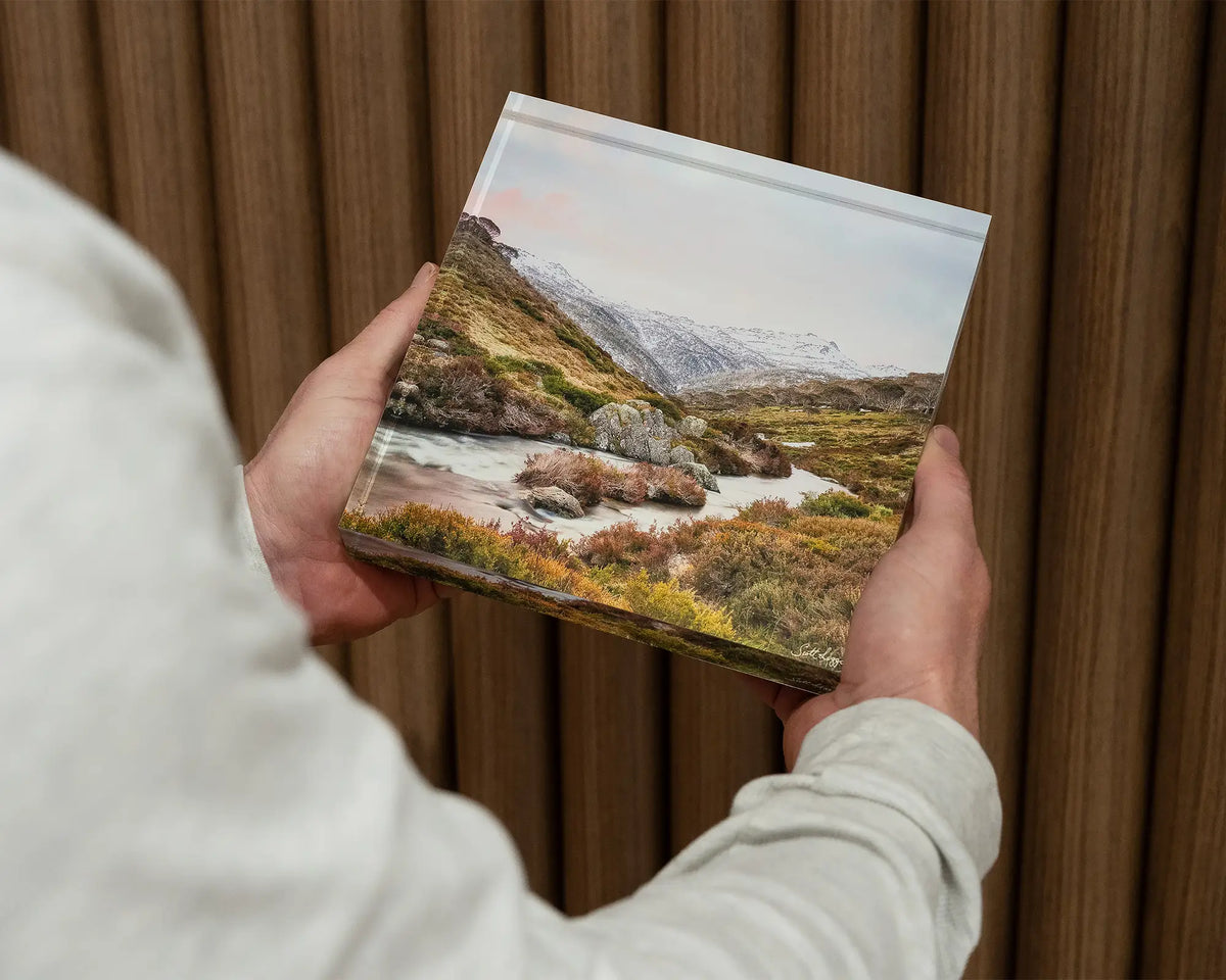 Looking Up. Acrylic block Thredbo River, Kosciuszko National Park, held in hands.