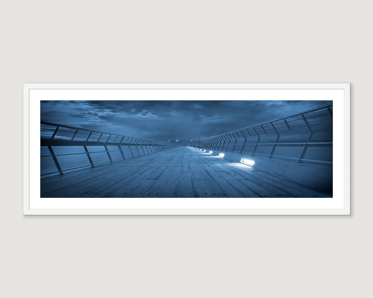 Wall art print of an abstract image of the Lorne Pier with storm clouds. 