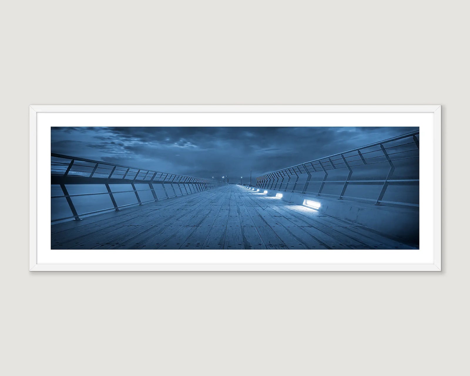 Wall art print of an abstract image of the Lorne Pier with storm clouds. 